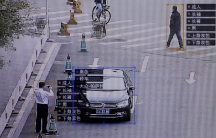SenseTime surveillance software identifying details about people and vehicles showing the information layered on top of the screen.