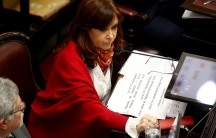Senator and former Argentine President Cristina Fernandez de Kirchner sits next to Senator Marcelo Fuentes as lawmakers debated a bill that would have legalized abortion, in Buenos Aires, Argentina, August 9, 2018.