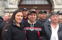 Rick Desautel, flanked by his daughter and his wife, Linda (right), celebrates his acquittal of illegal hunting charges outside the provincial courthouse in Nelson, British Columbia, in March 2017.