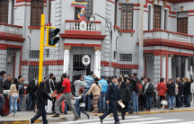 venezuelans gather outside their embassy in lima