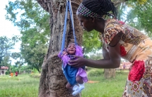 Mothers who attend nutrition classes in Matyebili, Uganda, have a chance to weigh their children