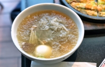 a bowl of Naengmyeon, cold noodles that originates from North Korea 