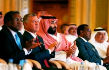 Saudi Crown Prince Mohammed bin Salman (center) is shown sitting in a row along with Jordan's King Abdullah II ibn Al Hussein.