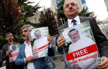 Human rights activists and friends of Saudi journalist Jamal Khashoggi hold his pictures during a protest outside the Saudi Consulate in Istanbul, Turkey October 8, 2018.