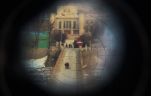Women, photographed from the Chinese side of the border
