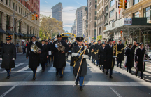Brian Endlein (C), of the US Army Reserve 78th Army Band, leads the band in marching during the annual New York City Veterans Day Parade in New York, Nov. 11, 2017.