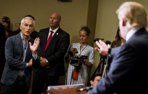 Republican presidential candidate Donald Trump spars with Univision reporter Jorge Ramos before his