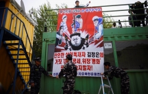 Park Sang-hak, a North Korean defector and leader of an anti-North Korea civic group, prepares to release balloons containing leaflets