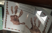School project of child's hand prints with poem, 