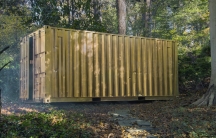 You step into this container, and connect with someone through video conference, in an identical container, somewhere else in the world.  