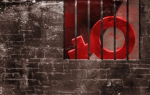 The icon for female is behind bars surrounded by a brick wall.