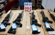 AR-15 rifles are displayed for sale at the Guntoberfest gun show in Oaks, Pennsylvania, Oct. 6, 2017.