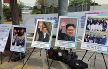 Positive signs celebrating the Inter-Korean Summit are seen near Seoul Station the day before on April 26, 2018.