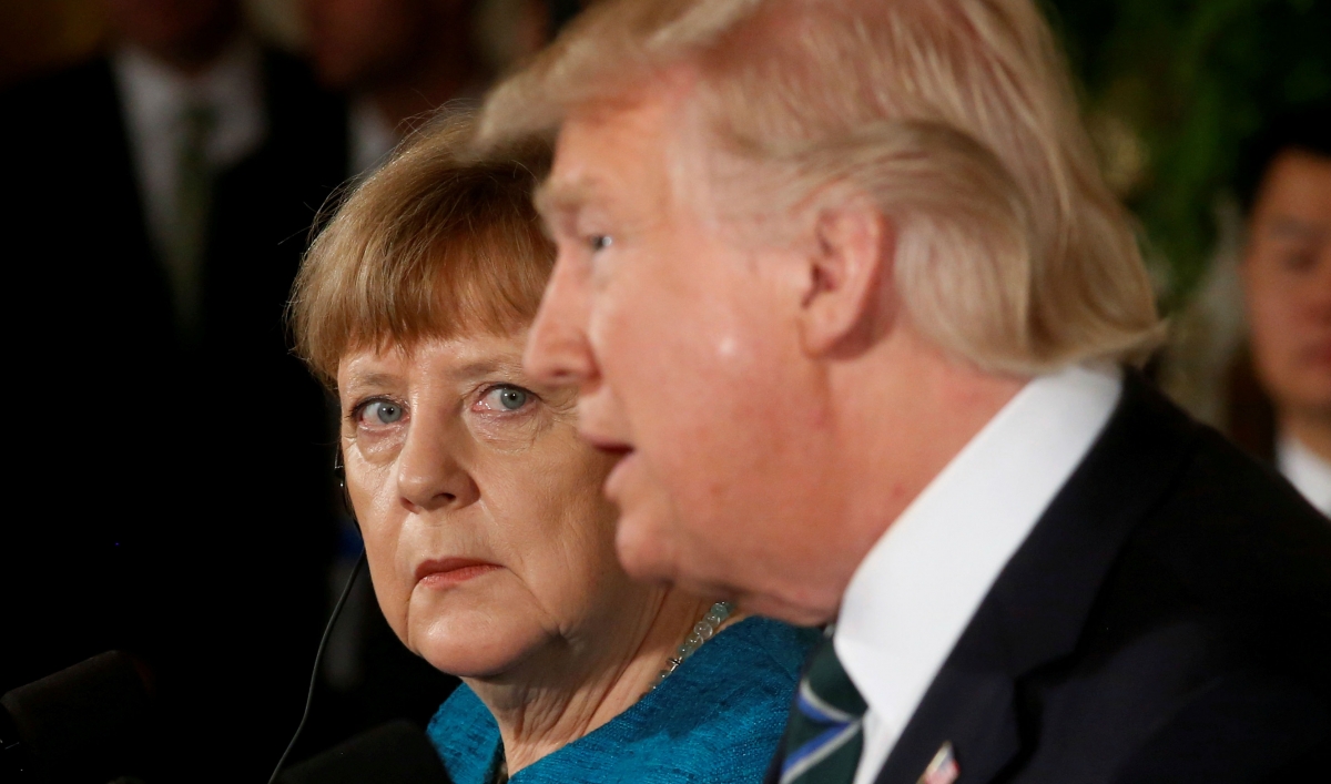 Germany's Chancellor Angela Merkel and President Donald Trump hold a joint news conference in the East Room of the White House in Washington, DC, March 17, 2017.