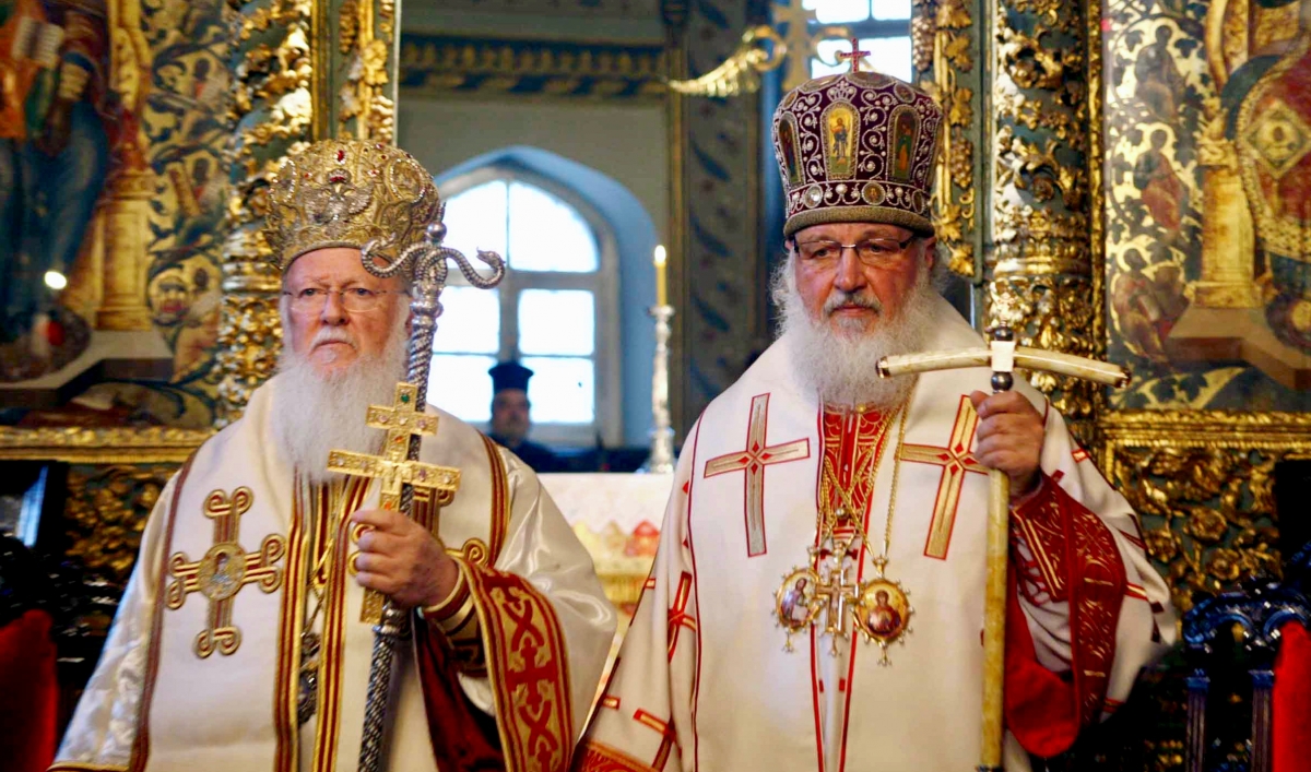 In this photo from 2009, the Ecumenical Patriarch, Bartholomew I (left) and Russian Orthodox Patriarch Kirill stand side-by-side during a Sunday service in the Patriarchal Cathedral of St. George at the Ecumenical Orthodox Patriarchate in Istanbul, Turkey