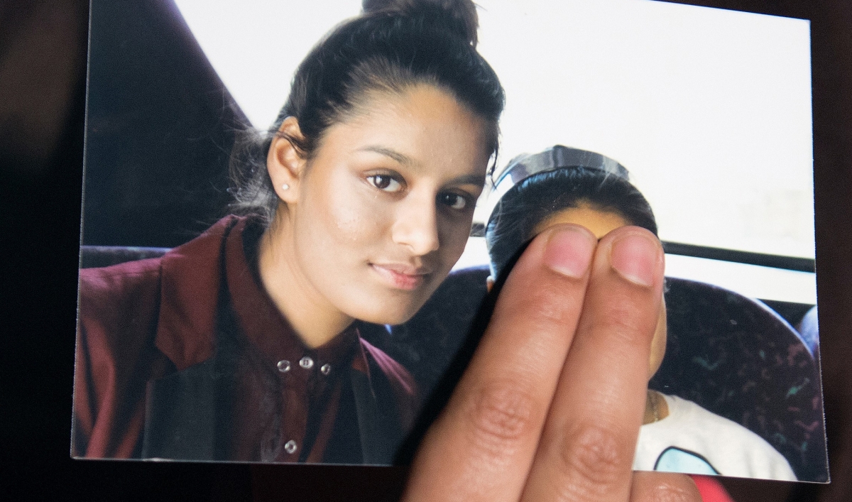 Renu Begum, sister of teenage British girl Shamima Begum who left the UK to join ISIS, holds a photo of her sister as she makes an appeal for Shemima to return home