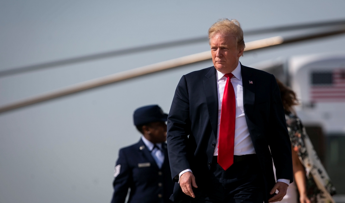 US President Donald Trump walks to board Air Force One as he travesl to Florida for Easter weekend, at Joint Base Andrews in Maryland, April 18, 2019.
