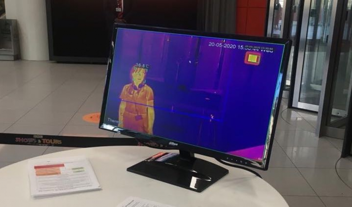 The World's Orla Barry is seen stepping through a thermal scanner at the BBC.