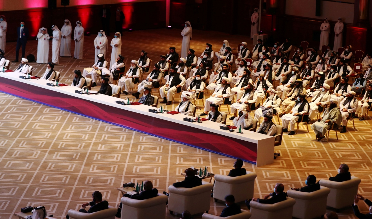 Delegates attend talks between the Afghan government and Taliban insurgents in Doha, Qatar, Sept. 12, 2020.
