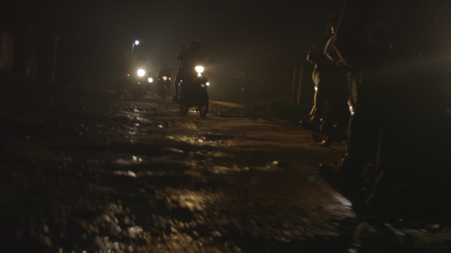 An anti-drug vigilante group called Patjasan speeds towards the home of a suspected meth user in Myitkyina, Myanmar. An anti-drug vigilante group called Patjasan speeds towards the home of a suspected meth user in Myitkyina, Myanmar.