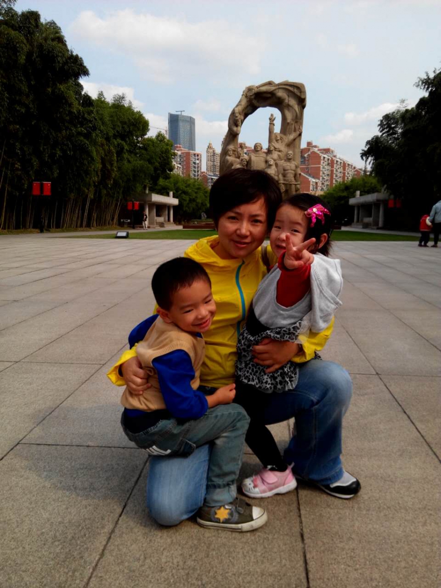 Christina Wang and her two children. Christina Wang and her two children.