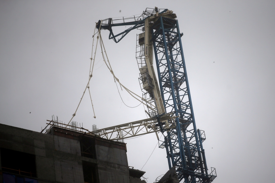 A collapsed construction crane is seen in downtown Miami as Hurricane Irma moved through south Florida. A collapsed construction crane is seen in downtown Miami as Hurricane Irma moved through south Florida.