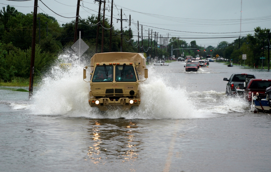 People are evacuated by a high water truck from the Hurricane Harvey floodwaters in Dickinson, Texas. People are evacuated by a high water truck from the Hurricane Harvey floodwaters in Dickinson, Texas.