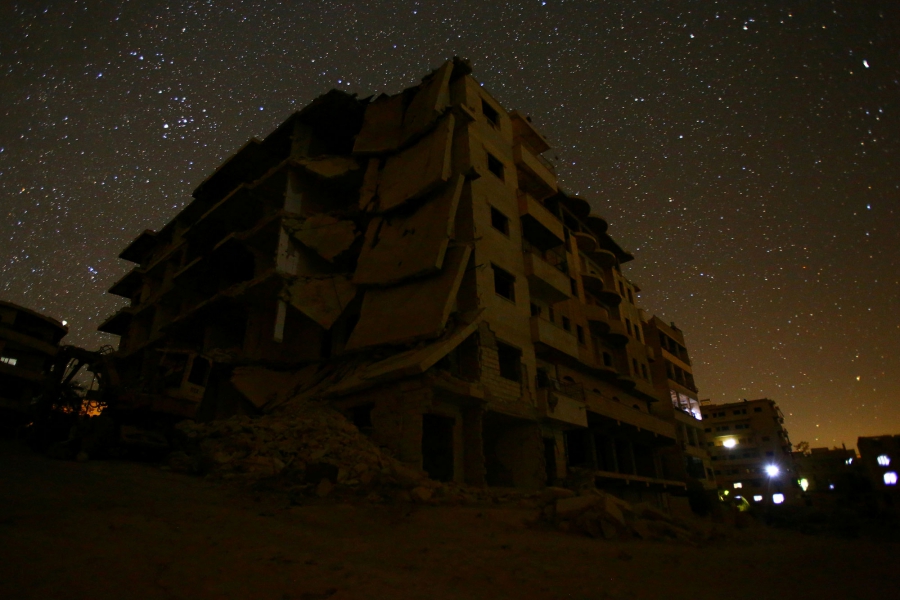 Damaged buildings stand in the rebel-controlled area of Maaret al-Numan in Idlib province. Damaged buildings stand in the rebel-controlled area of Maaret al-Numan in Idlib province.