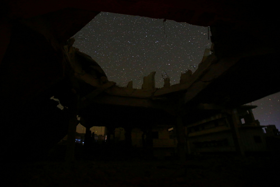 A damaged building stands in the rebel-controlled town of Binnish in Idlib province. A damaged building stands in the rebel-controlled town of Binnish in Idlib province.