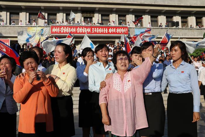 North Koreans rally to express "boiling and spreading" anger toward South Korea in October 2016, according to North Korean propaganda channels. North Koreans rally to express "boiling and spreading" anger toward South Korea in October 2016, according to North Korean propaganda channels.