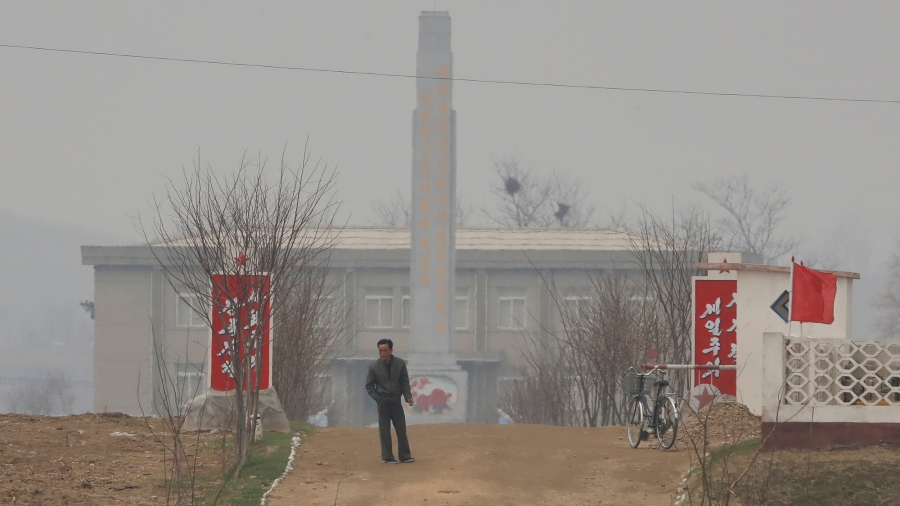 A North Korean man stands in Sinuiju, North Korea, which borders Dandong of China's Liaoning province. A North Korean man stands in Sinuiju, North Korea, which borders Dandong of China's Liaoning province.