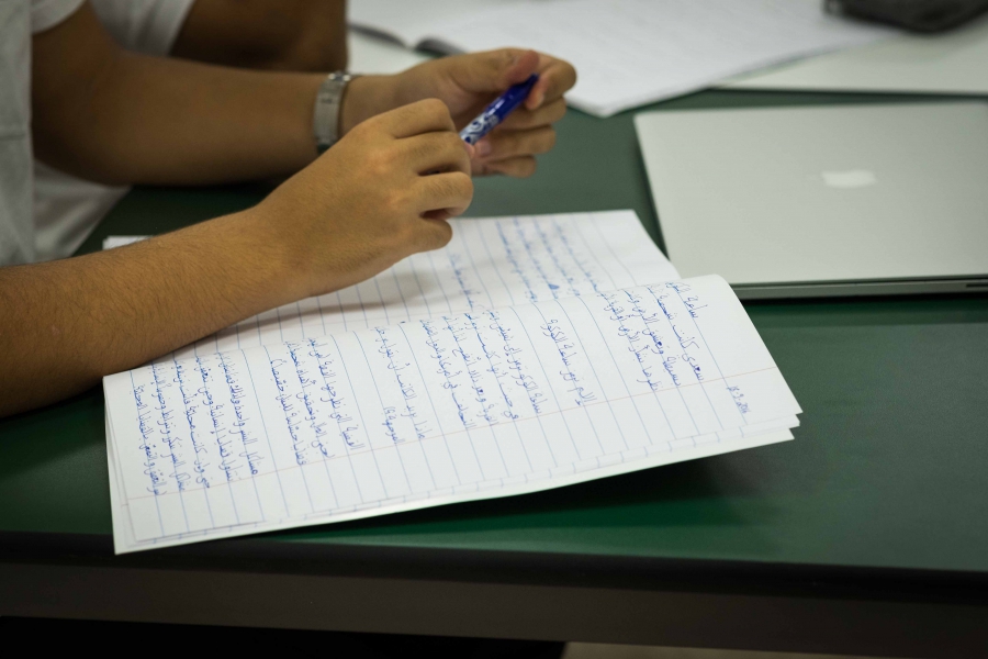 A student's notebook at an advanced Arabic class in Dubai. A student's notebook at an advanced Arabic class in Dubai.
