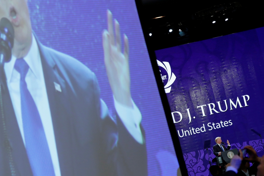 President Donald Trump appears on a large video screen as he delivers remarks at the APEC CEO Summit, Nov. 10, 2017. President Donald Trump appears on a large video screen as he delivers remarks at the APEC CEO Summit, Nov. 10, 2017.