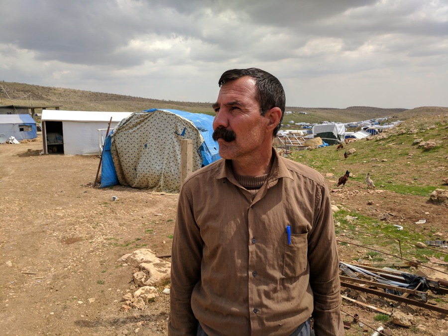 Hassan Selo, 41, has recently moved farther up Mount Sinjar. Hassan Selo, 41, has recently moved farther up Mount Sinjar.