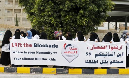 Healthcare workers demonstrate against the blockade outside the UN headquarters in Sanaa. Healthcare workers demonstrate against the blockade outside the UN headquarters in Sanaa.