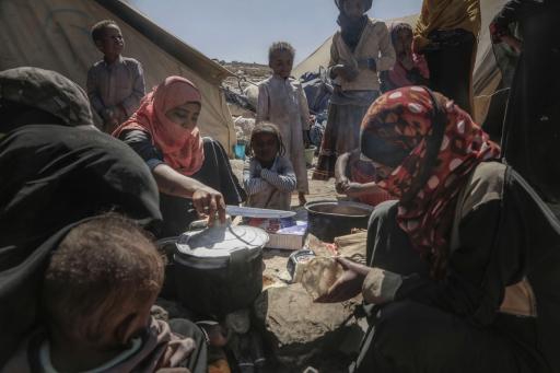 A displaced family burns plastic bottles, a toxic hazard, to cook a precious meal. They know it’s not good for them, but there is no coal or wood in the area. Humanitarian aid rarely reaches them. A displaced family burns plastic bottles, a toxic hazard, to cook a precious meal. They know it’s not good for them, but there is no coal or wood in the area. Humanitarian aid rarely reaches them.