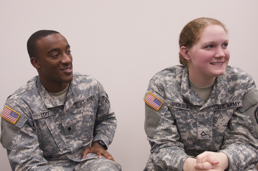 Spc. Jason Lott and Pvt. First Class Laura Jackson are both network warfare specialists, the soldiers who protect the Army's computer networks against cyber attacks. Spc. Jason Lott and Pvt. First Class Laura Jackson are both network warfare specialists, the soldiers who protect the Army's computer networks against cyber attacks.