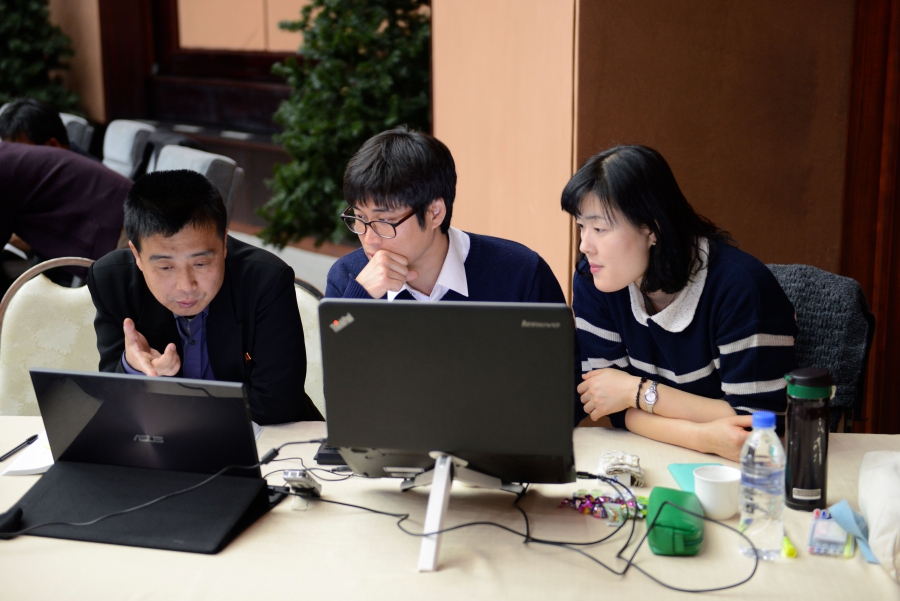 Editors confer at the offices of the unified Korean dictionary. Editors confer at the offices of the unified Korean dictionary.