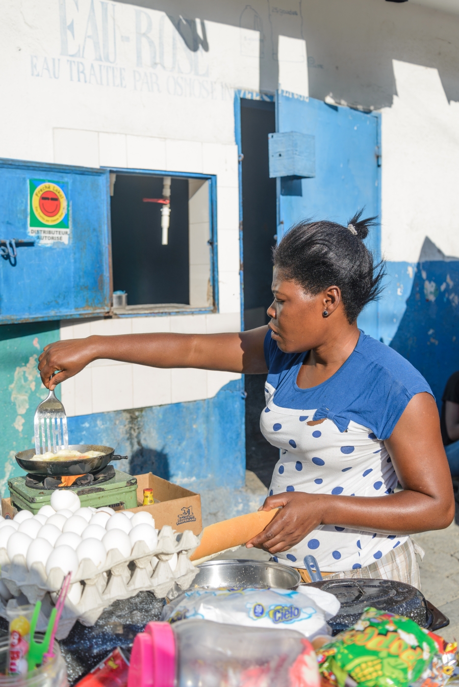 Phita, who did not give her last name, sells cooked eggs in Marché Salomon, in Port-au-Prince, Haiti.