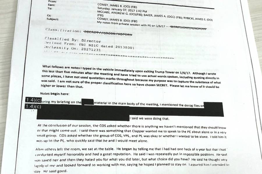 The partially redacted memos of former FBI Director James Comey, recounting conversations with President Donald Trump last year, are pictured after US Justice Department released them to three House of Representatives committees. The partially redacted memos of former FBI Director James Comey, recounting conversations with President Donald Trump last year, are pictured after US Justice Department released them to three House of Representatives committees.