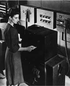 Frances Bilas Spence feeding punch cards into ENIAC, Feb 1946. Frances Bilas Spence feeding punch cards into ENIAC, Feb 1946.