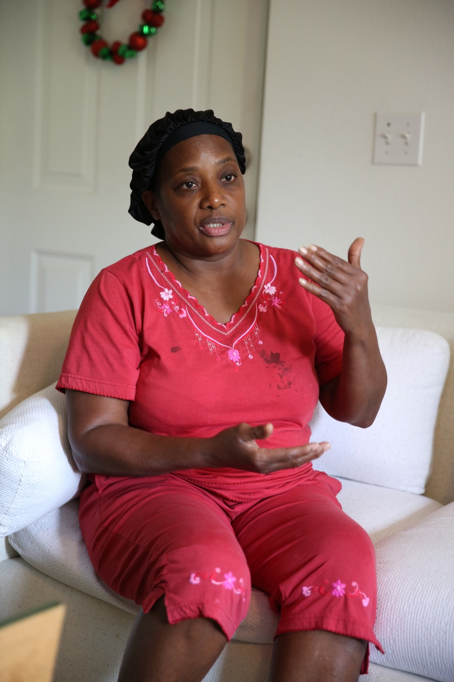 Cynthia Louis during a home visit from Nicole Neufeld, a social work student from Florida International University. Cynthia Louis during a home visit from Nicole Neufeld, a social work student from Florida International University.