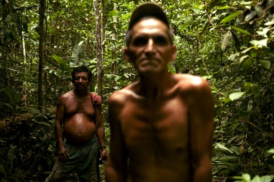 coca leaf farmers in Colombia with their harvest