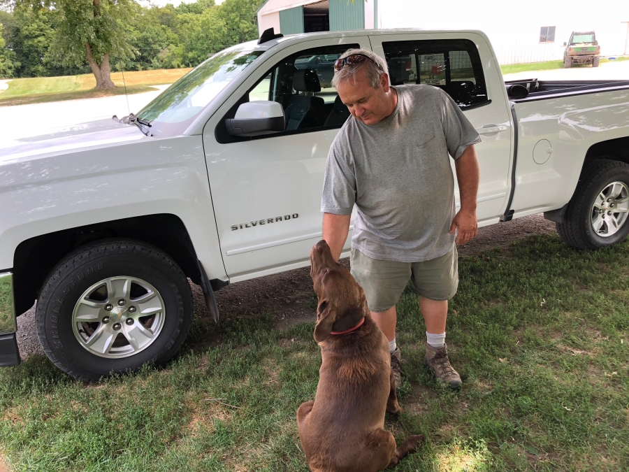 Farmer Dale Hadden and his dog Boomer. Hadden worries that if commodity prices stay depressed into next year, there will be an exodus of people farming in Illinois Farmer Dale Hadden and his dog Boomer. Hadden worries that if commodity prices stay depressed into next year, there will be an exodus of people farming in Illinois