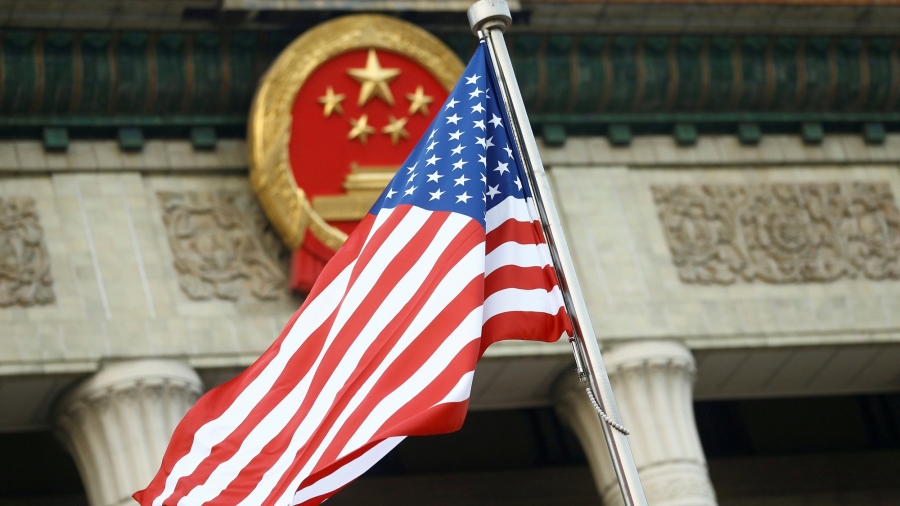 A US flag is seen during a welcoming ceremony in Beijing, China. A US flag is seen during a welcoming ceremony in Beijing, China.