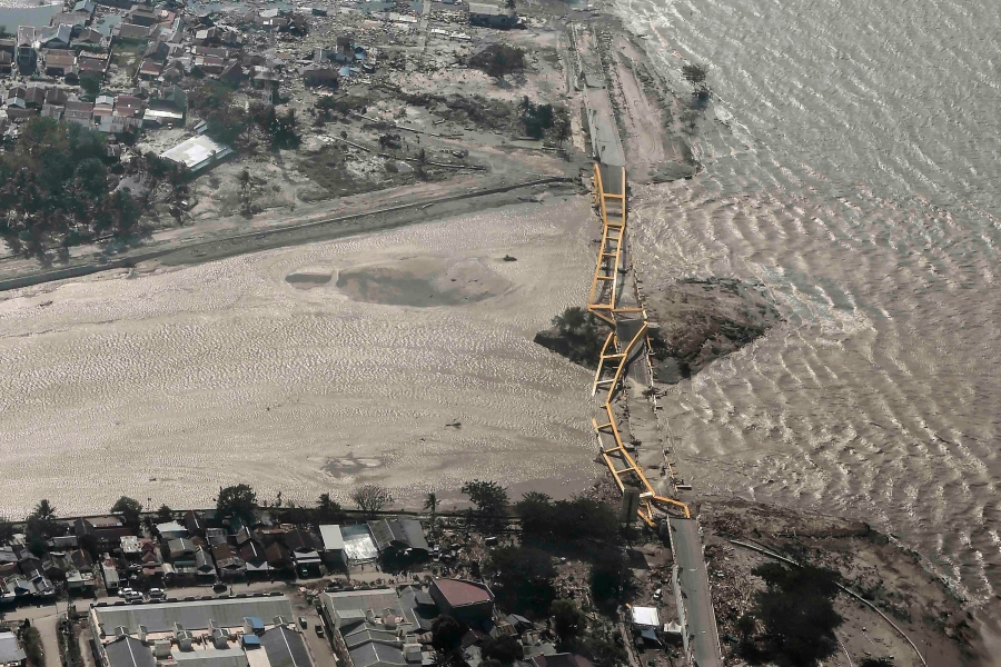 An aerial view shows bridge damaged by an earthquake and tsunami i
