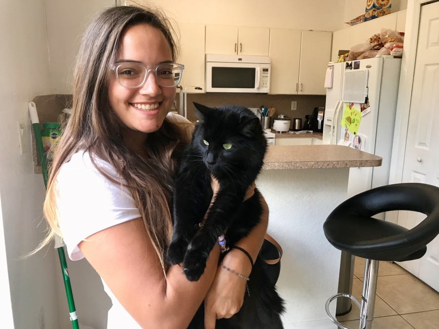 Woman holding cat
