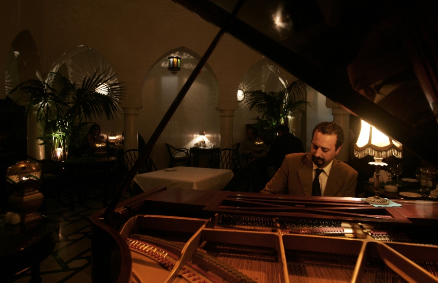 Pianist Issam Chabaa plays at Rick's Cafe in Casablanca