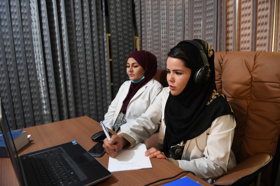 Midwives take calls at the Midwifery Helpline Center in Kabul, Afghanistan. Midwives take calls at the Midwifery Helpline Center in Kabul, Afghanistan.