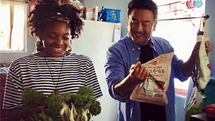 Olympia Auset cooks with chef Roy Choi as part of Choi's "Broken Bread" TV program. Olympia Auset cooks with chef Roy Choi
